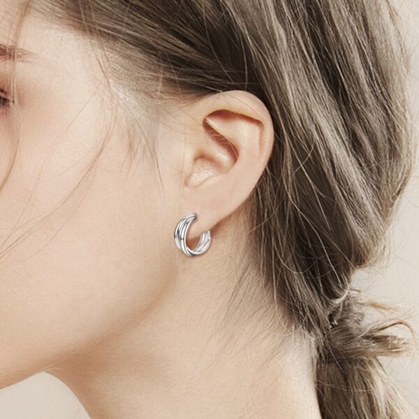 Dámské stříbrné náušnice propletené