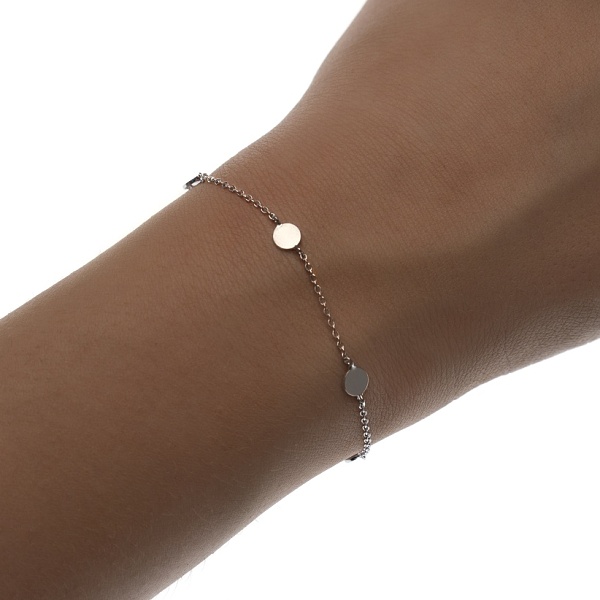 Dámský stříbrný náramek s penízky